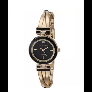 Anne Klein black gold tone crossover bangle watch